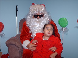 Santa holding a small child